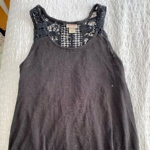Black high low loose tank top with crocheted back